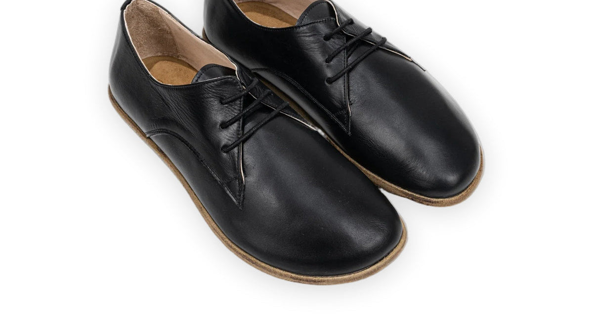 Handcrafted black full-grain leather barefoot oxford shoes for men with zero-drop sole and wide toe box by Bespoky