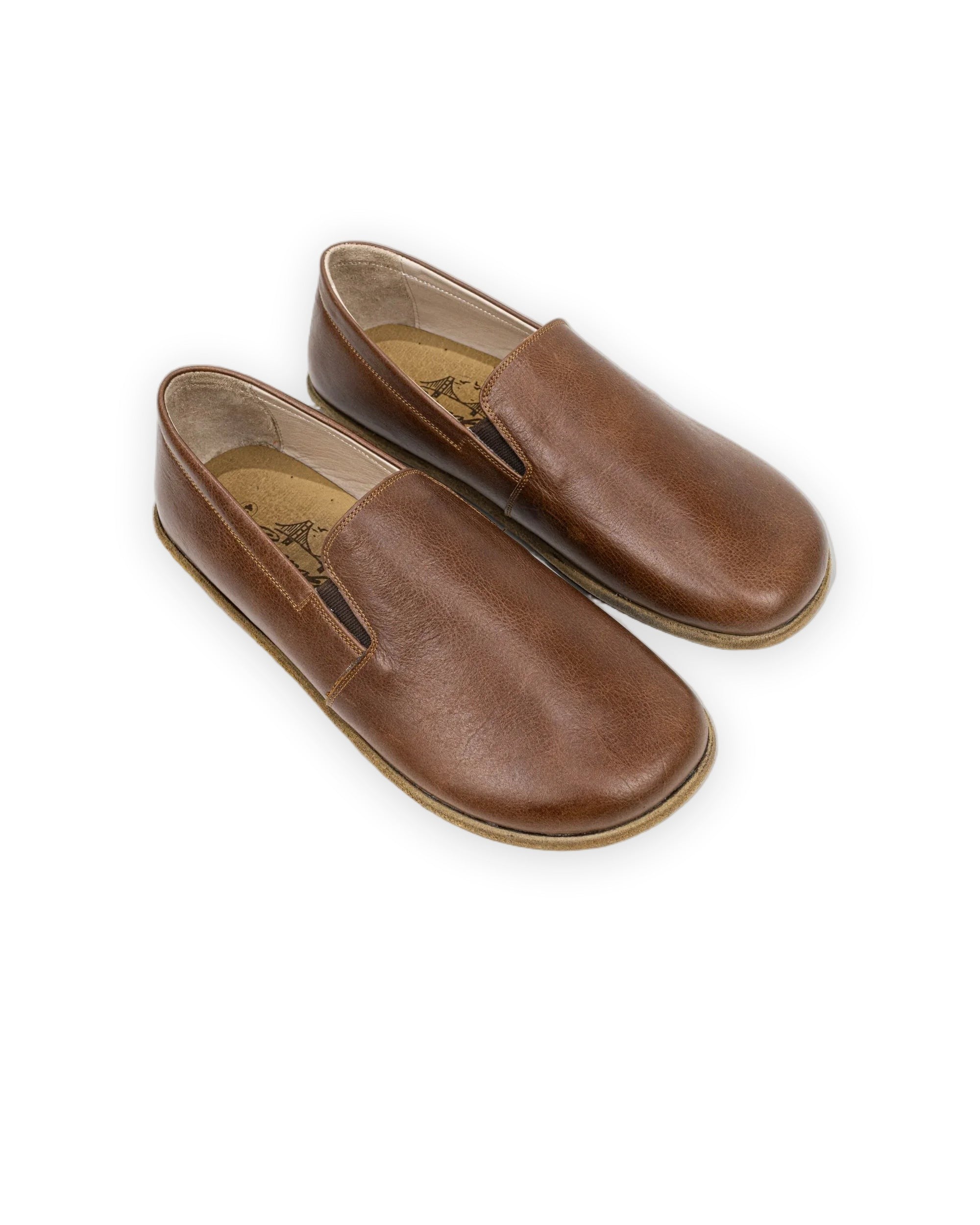 Brown full-grain leather barefoot shoes with a wide toe box by Bespoky, the foot-shaped fit an accurate size chart measurement is made for